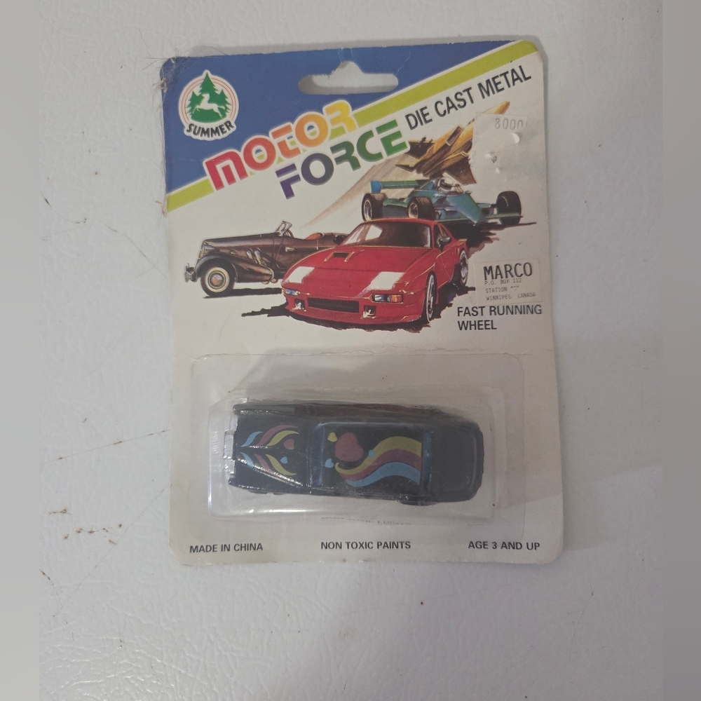Vintage Summer Motor Force die-cast metal toy car.